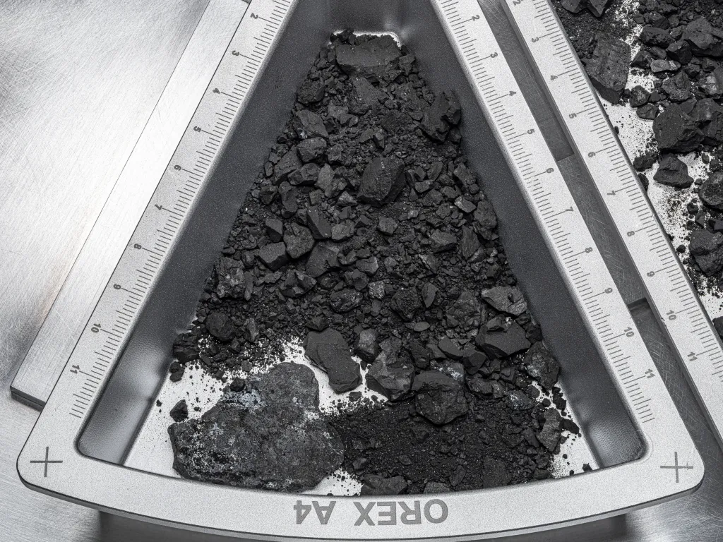 The half a gram of Bennu material that was sent to ETH Zurich. Credit - Erika Blumenfeld &amp; Joseph Aebersold / NASA